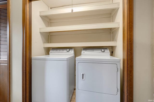 laundry room with washer and dryer