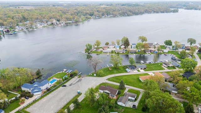 aerial overview of property's location featuring a large body of water and nearby suburban area