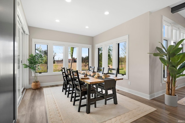 874 Cascata Trl, Huntertown, IN 46748 - dining area featuring baseboards, wood finished floors, and recessed lighting