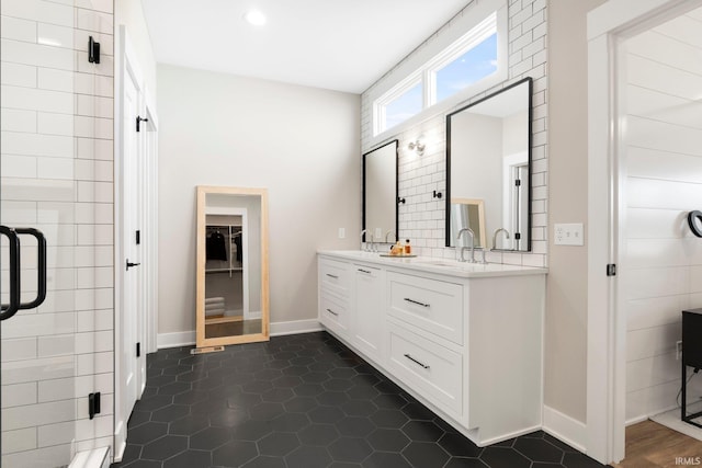 874 Cascata Trl, Huntertown, IN 46748 - full bath featuring vanity, baseboards, a stall shower, tile patterned floors, and a closet