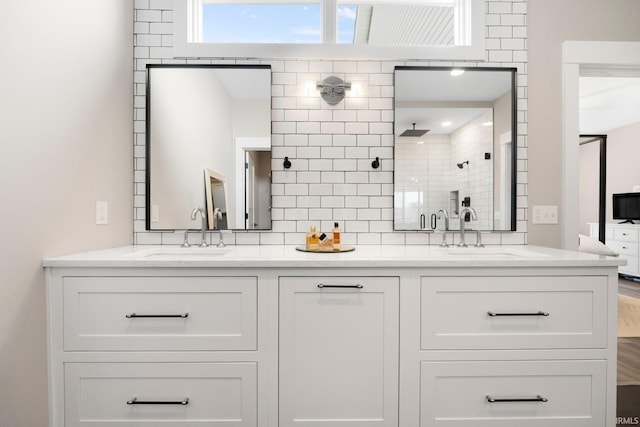 874 Cascata Trl, Huntertown, IN 46748 - bathroom with a stall shower, double vanity, and decorative backsplash