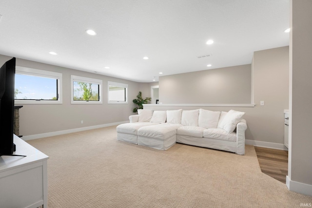 874 Cascata Trl, Huntertown, IN 46748 - living room featuring recessed lighting, baseboards, and light carpet