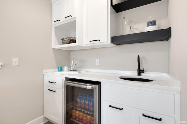 874 Cascata Trl, Huntertown, IN 46748 - indoor bar featuring beverage cooler and baseboards