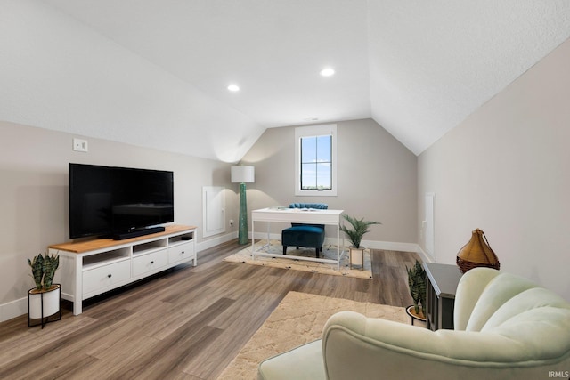 874 Cascata Trl, Huntertown, IN 46748 - living room featuring baseboards, wood finished floors, lofted ceiling, and recessed lighting