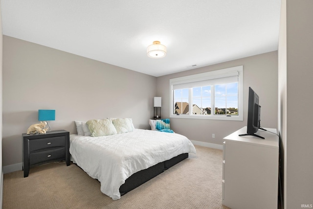 874 Cascata Trl, Huntertown, IN 46748 - bedroom featuring light carpet and baseboards