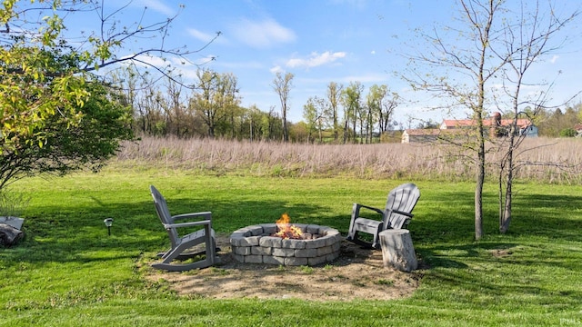 874 Cascata Trl, Huntertown, IN 46748 - view of grassy yard featuring an outdoor fire pit