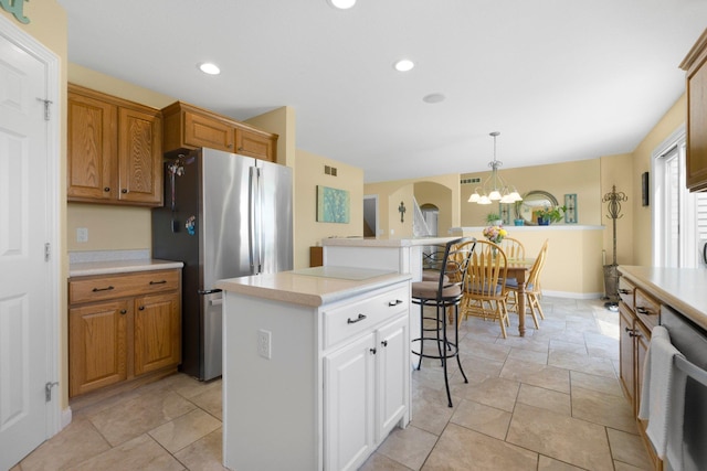3090 Kellygreen Dr, Angola, IN 46703 - kitchen with freestanding refrigerator, a chandelier, light countertops, dishwasher, and recessed lighting