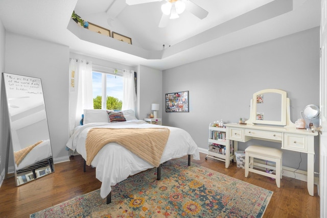3090 Kellygreen Dr, Angola, IN 46703 - bedroom featuring lofted ceiling, baseboards, wood finished floors, and a ceiling fan