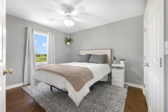 3090 Kellygreen Dr, Angola, IN 46703 - bedroom with baseboards, wood finished floors, and ceiling fan