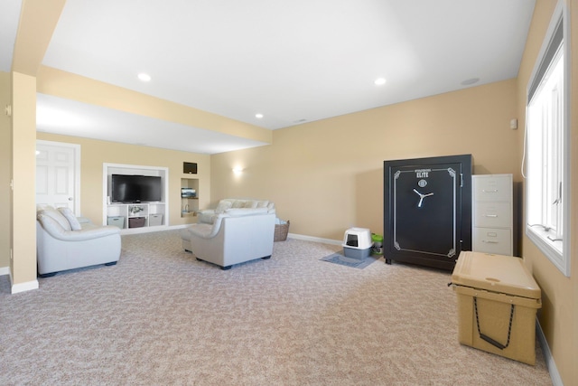 3090 Kellygreen Dr, Angola, IN 46703 - carpeted living room with baseboards, built in features, and recessed lighting