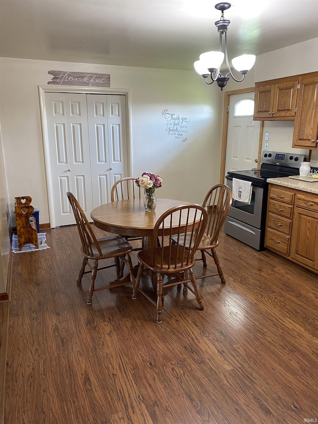 4227 S 0th Rd, Berne, IN 46711 - dining area with dark wood-type flooring and a chandelier