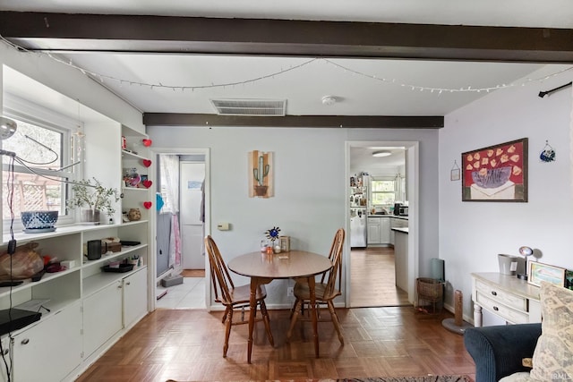 dining area featuring baseboards