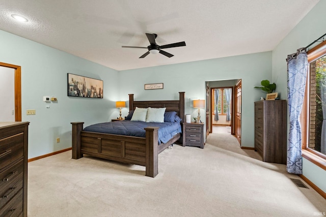 15 Saint Emily Dr, Huntington, IN 46750 - bedroom with light colored carpet, baseboards, and ceiling fan