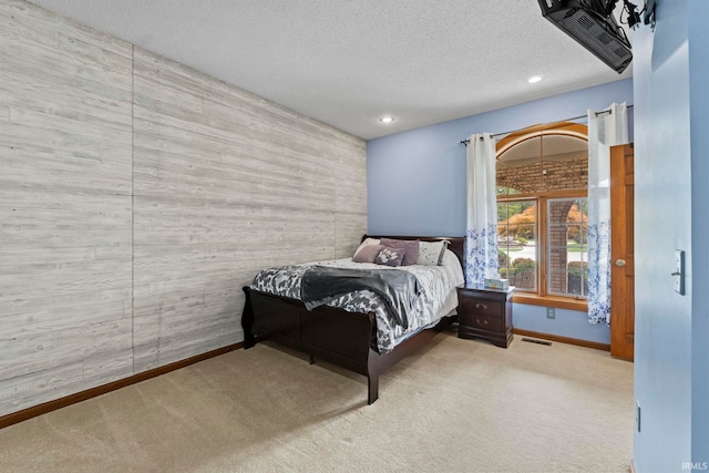 15 Saint Emily Dr, Huntington, IN 46750 - carpeted bedroom with baseboards, a textured ceiling, and recessed lighting