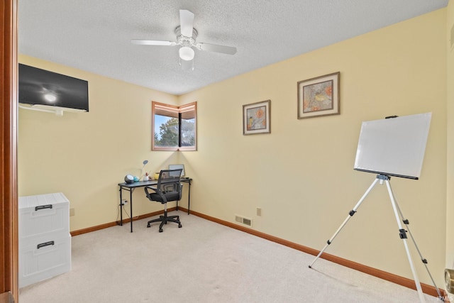 15 Saint Emily Dr, Huntington, IN 46750 - carpeted office space with baseboards, ceiling fan, and a textured ceiling