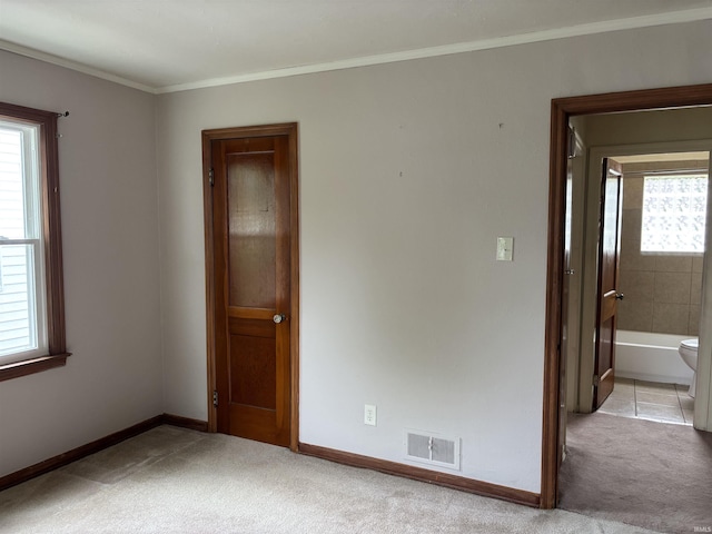 919 Kensington Blvd, Fort Wayne, IN 46805 - carpeted spare room with baseboards and crown molding