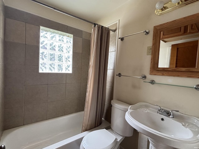 919 Kensington Blvd, Fort Wayne, IN 46805 - full bath with a sink, shower / bathtub combination with curtain, and toilet