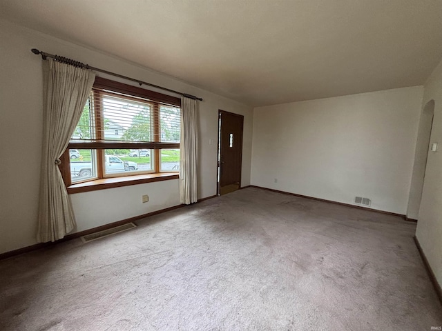 919 Kensington Blvd, Fort Wayne, IN 46805 - spare room featuring carpet flooring and baseboards