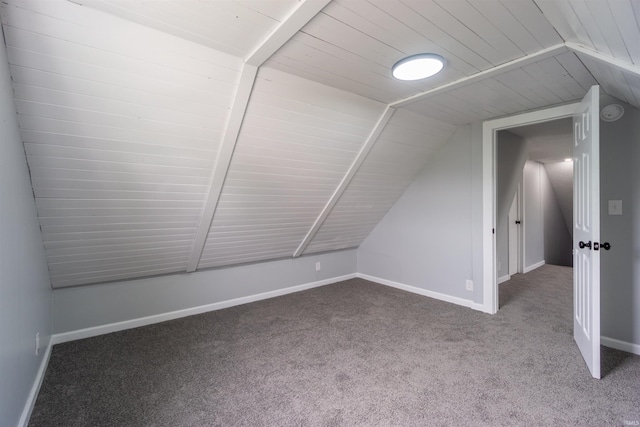 bonus room with lofted ceiling, carpet, baseboards, and wooden ceiling