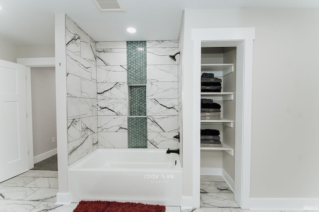 full bath featuring marble look tile flooring, baseboards, shower / bath combination, and recessed lighting
