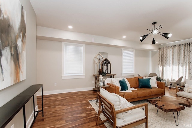 living area featuring wood finished floors, recessed lighting, and baseboards