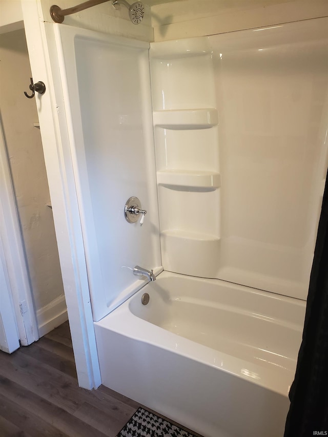 9067 W 290, Delphi, IN 46923 - full bath featuring wood finished floors and bathing tub / shower combination