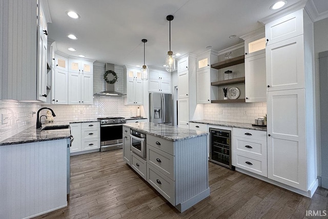 kitchen with beverage cooler, appliances with stainless steel finishes, wall chimney exhaust hood, open shelves, and tasteful backsplash