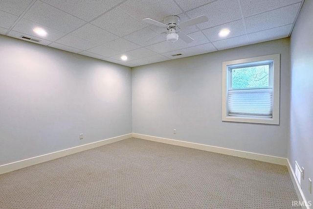 empty room with carpet, a paneled ceiling, baseboards, ceiling fan, and recessed lighting