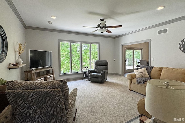 living room featuring ornamental molding, carpet flooring, ceiling fan, recessed lighting, and baseboards