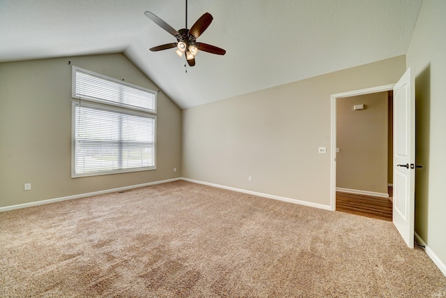1592 Breckenridge Pass, Fort Wayne, IN 46845 - carpeted spare room featuring ceiling fan, lofted ceiling, and baseboards