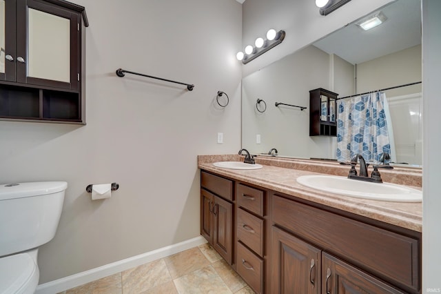 1592 Breckenridge Pass, Fort Wayne, IN 46845 - full bathroom featuring toilet, baseboards, double vanity, and tile patterned flooring