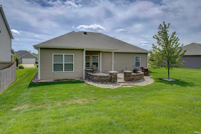 1592 Breckenridge Pass, Fort Wayne, IN 46845 - back of property featuring a patio, a lawn, roof with shingles, and an outdoor fire pit