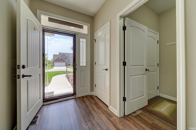 1592 Breckenridge Pass, Fort Wayne, IN 46845 - foyer with dark wood-style flooring and baseboards