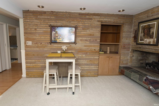 dining room with light carpet