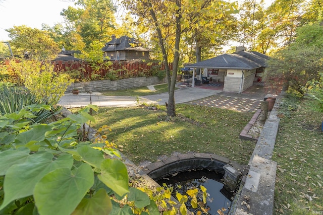 view of yard with a patio area