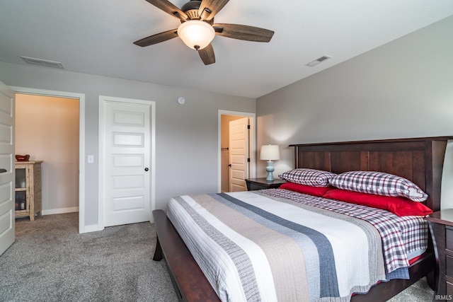 bedroom with carpet, a ceiling fan, and baseboards