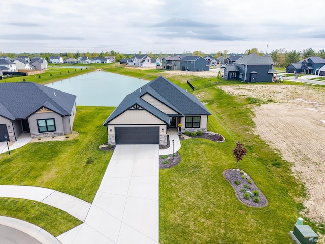 aerial perspective of suburban area featuring a large body of water