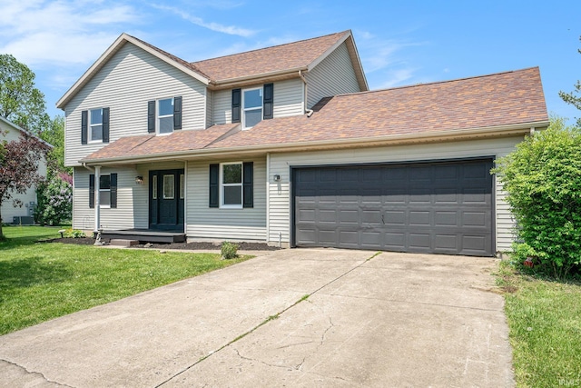 view of front of home featuring driveway, an attached garage, a front yard, and roof with shingles