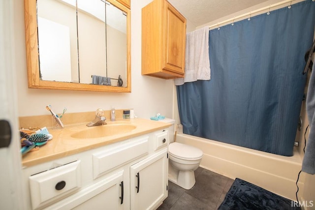 1831/1833 S Maxwell St, Bloomington, IN 47401 - bathroom featuring tile patterned floors, vanity, shower / bath combo with shower curtain, and toilet