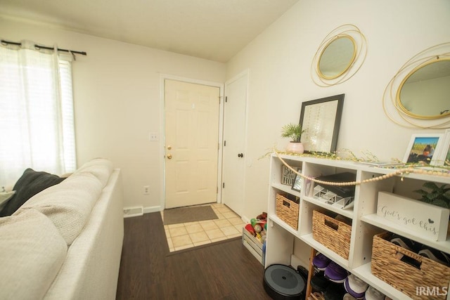1831/1833 S Maxwell St, Bloomington, IN 47401 - entrance foyer featuring wood finished floors and baseboards