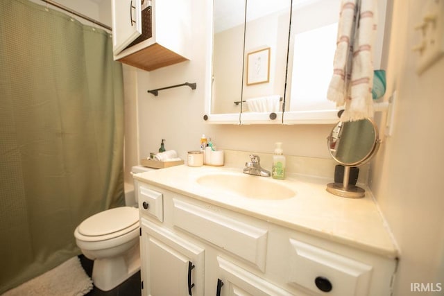 1831/1833 S Maxwell St, Bloomington, IN 47401 - bathroom with toilet, vanity, and a shower with shower curtain