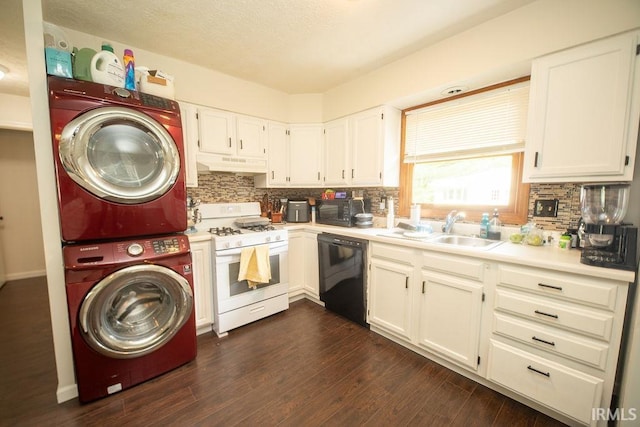 1831/1833 S Maxwell St, Bloomington, IN 47401 - kitchen featuring white gas range oven, dishwasher, estacked washer and dryer, under cabinet range hood, and a sink