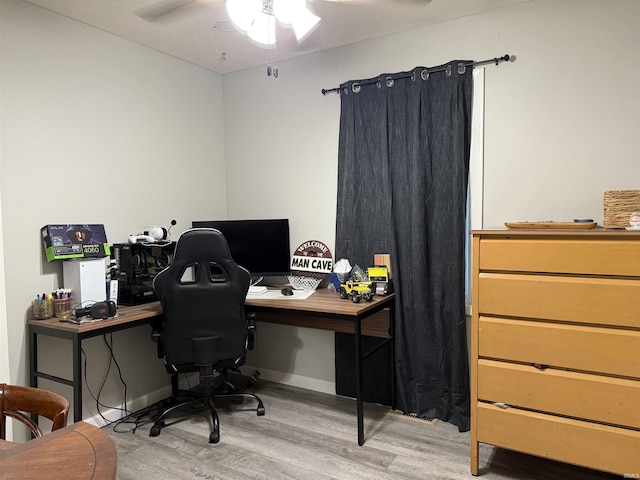 2823 Hillside Dr, Bedford, IN 47421 - office with wood finished floors and a ceiling fan