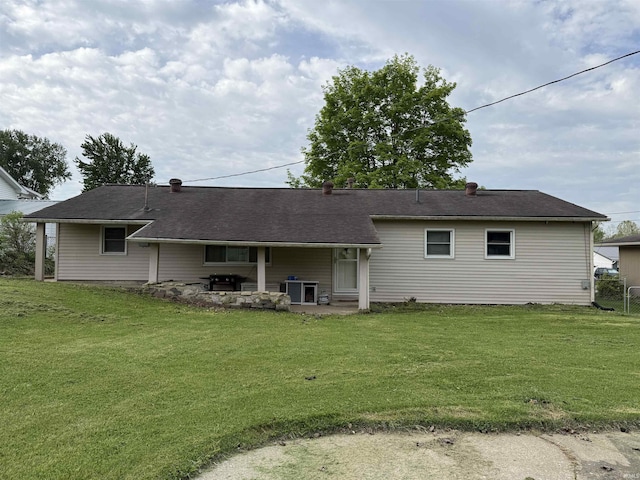 2823 Hillside Dr, Bedford, IN 47421 - rear view of house with a yard and a patio area
