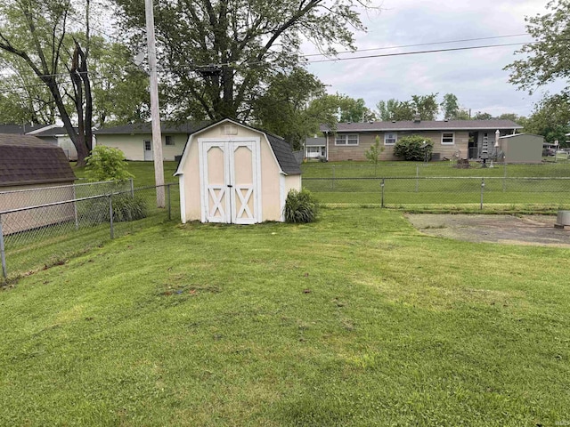 2823 Hillside Dr, Bedford, IN 47421 - view of yard with a storage unit and an outbuilding