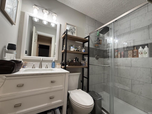 2823 Hillside Dr, Bedford, IN 47421 - bathroom featuring a stall shower, a textured ceiling, toilet, and vanity