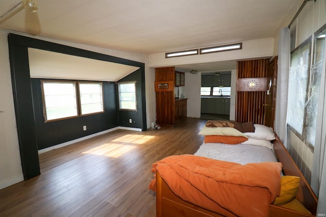 1008 W Elm St, Hartford City, IN 47348 - bedroom featuring wood finished floors, baseboards, and a sink