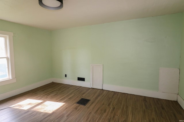 1008 W Elm St, Hartford City, IN 47348 - unfurnished room featuring wood finished floors and baseboards