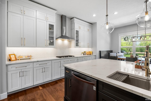 8086 Shepardson Creek Dr, Lafayette, IN 47905 - kitchen with wall chimney range hood, dishwasher, dark wood-type flooring, tasteful backsplash, and a sink