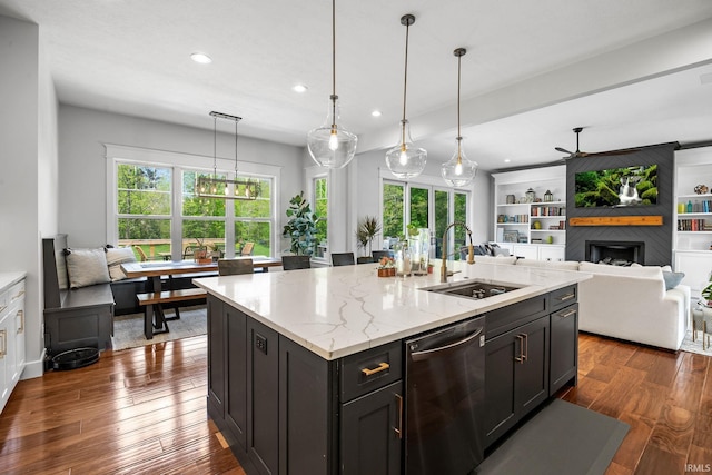 8086 Shepardson Creek Dr, Lafayette, IN 47905 - kitchen with a sink, dishwasher, a large fireplace, recessed lighting, and open floor plan